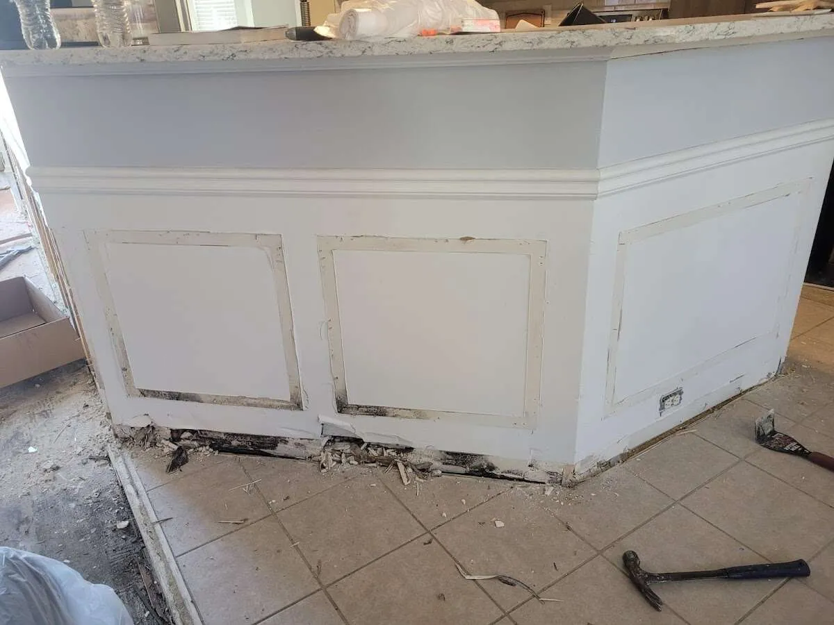 Water damage and mold on kitchen during Storm Damage Restoration in Spring Valley Lake